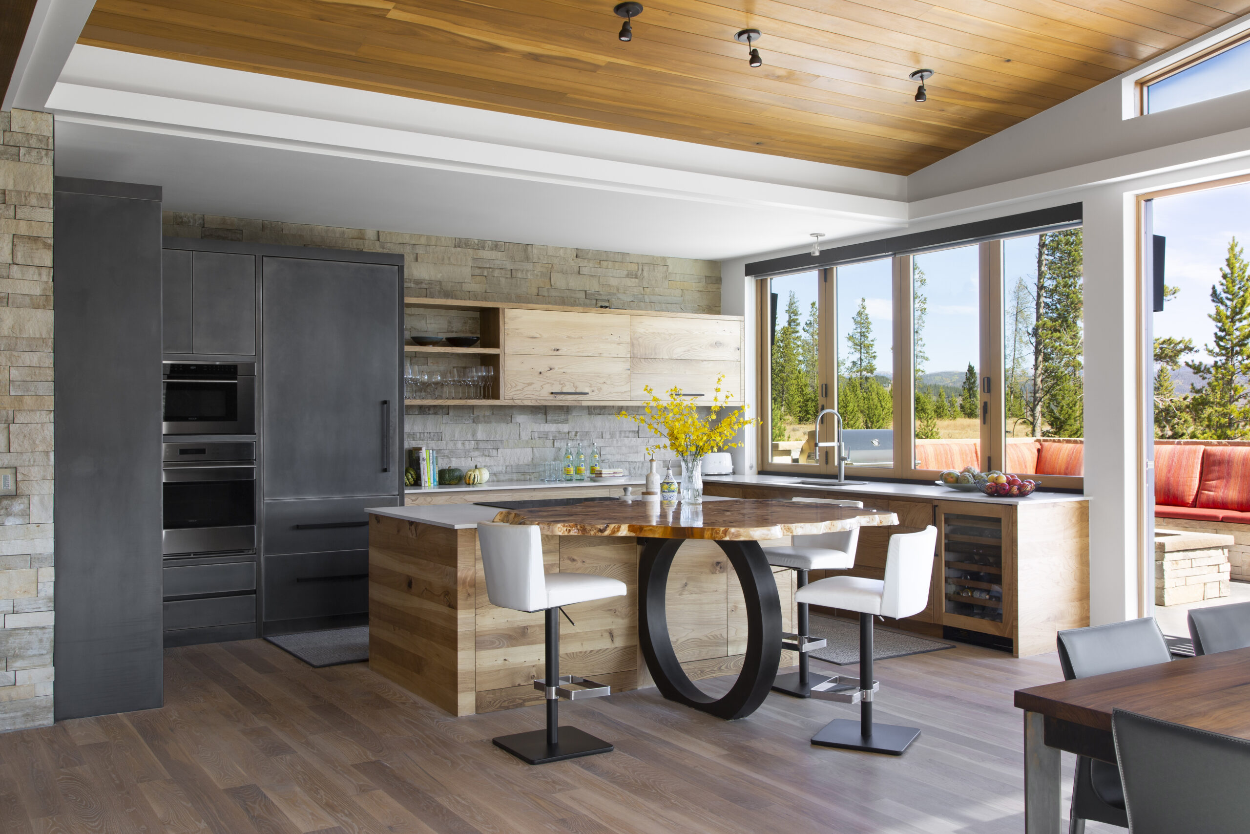 Ewers Architecture modern kitchen opens to the view